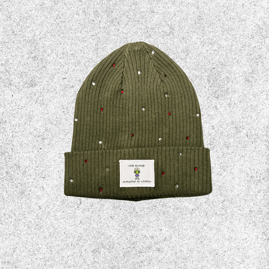 Green beanie with red and clear rhinestones with Les Aliens patch in center.