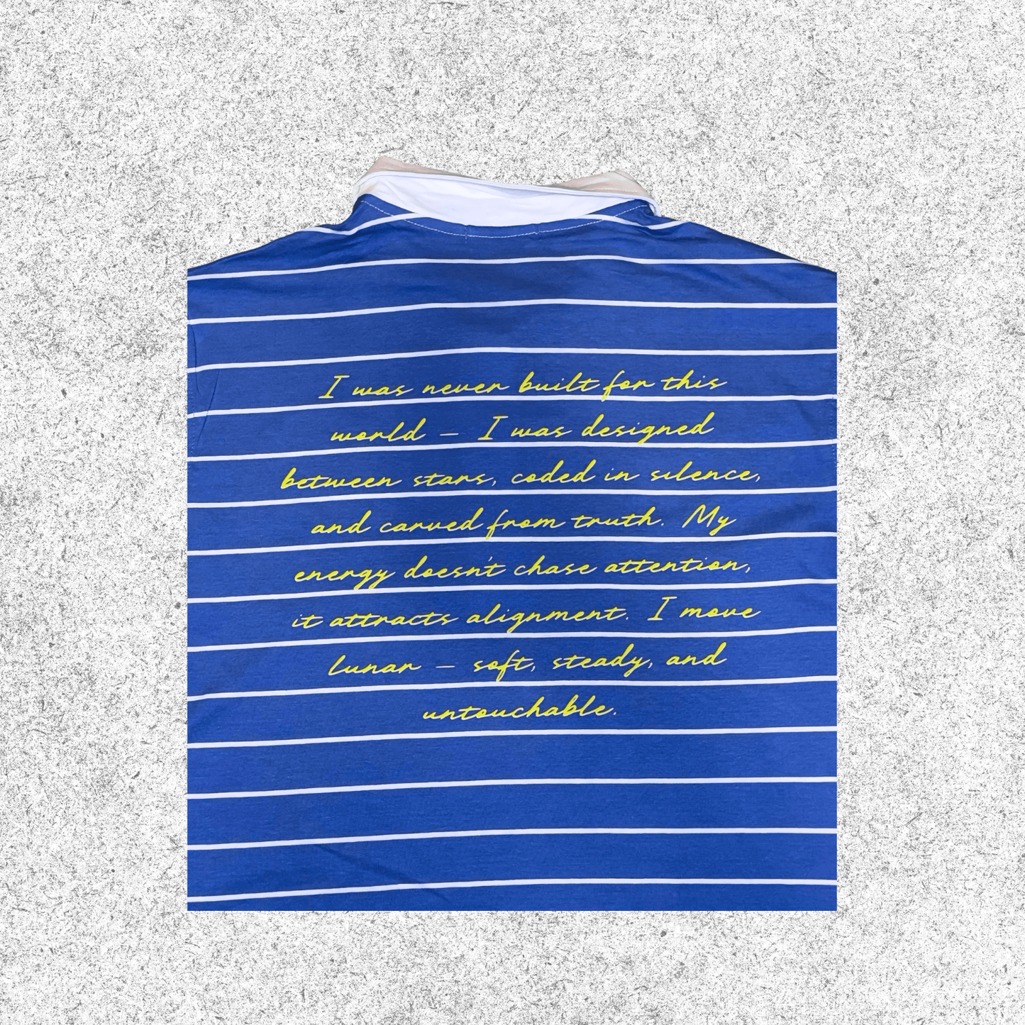 Blue and white striped shirt with yellow text of Les Aliens Pledge.
