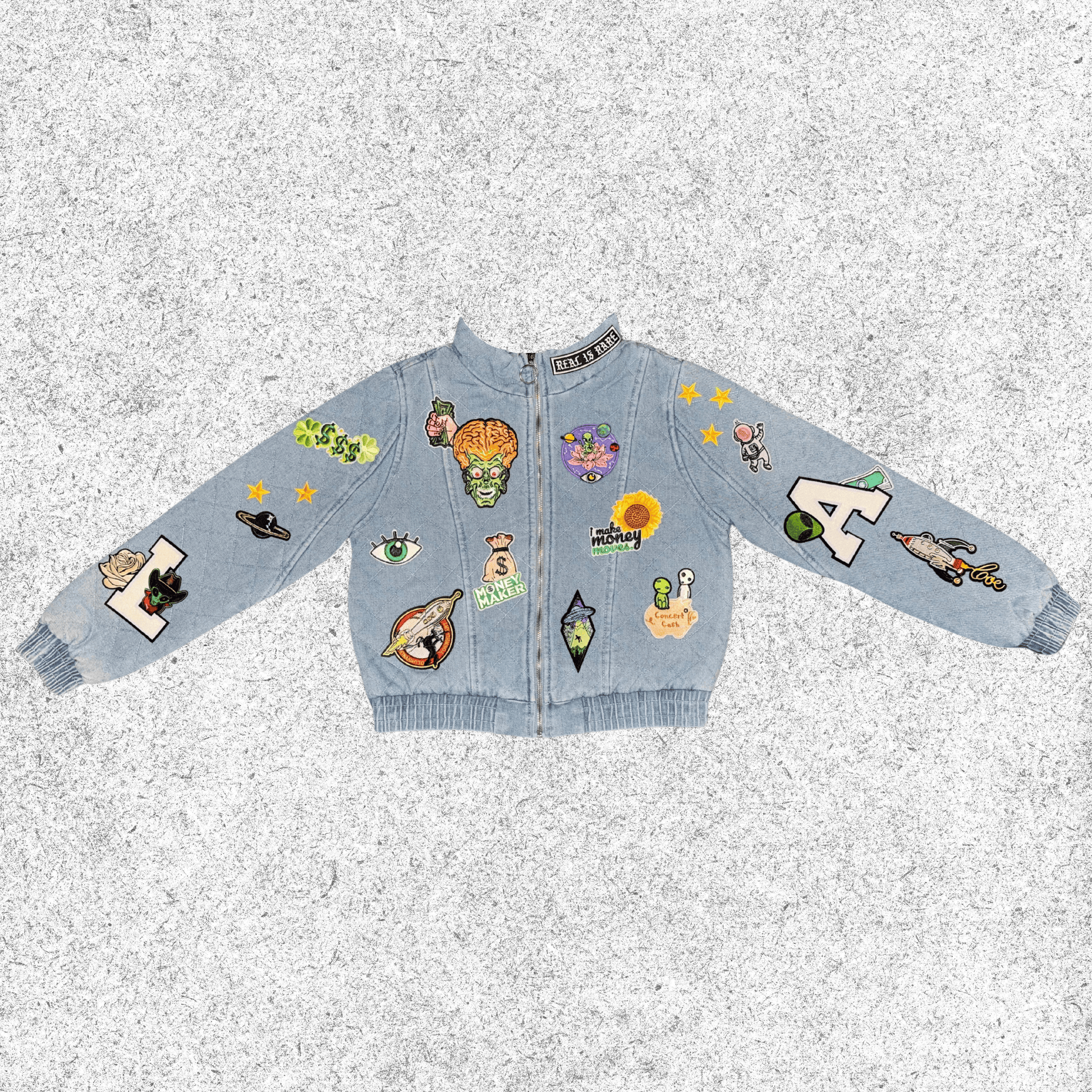 Light blue jacket with various colorful cosmic themed patches , quilted bomber front view.