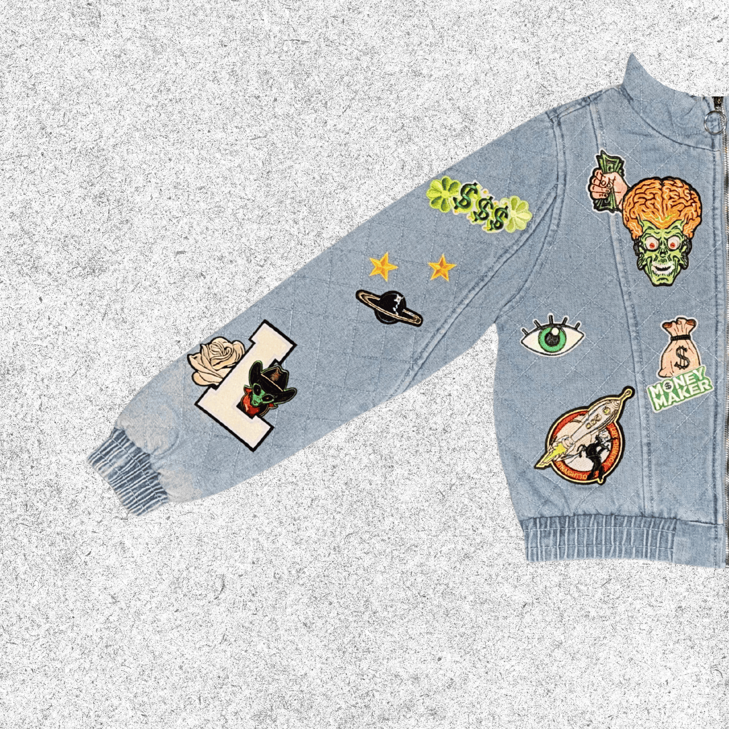 Denim jacket with various patches closer view.