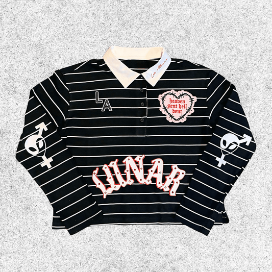 Black and white striped shirt with text and graphics, Lunar edition front view, sleeves folded.