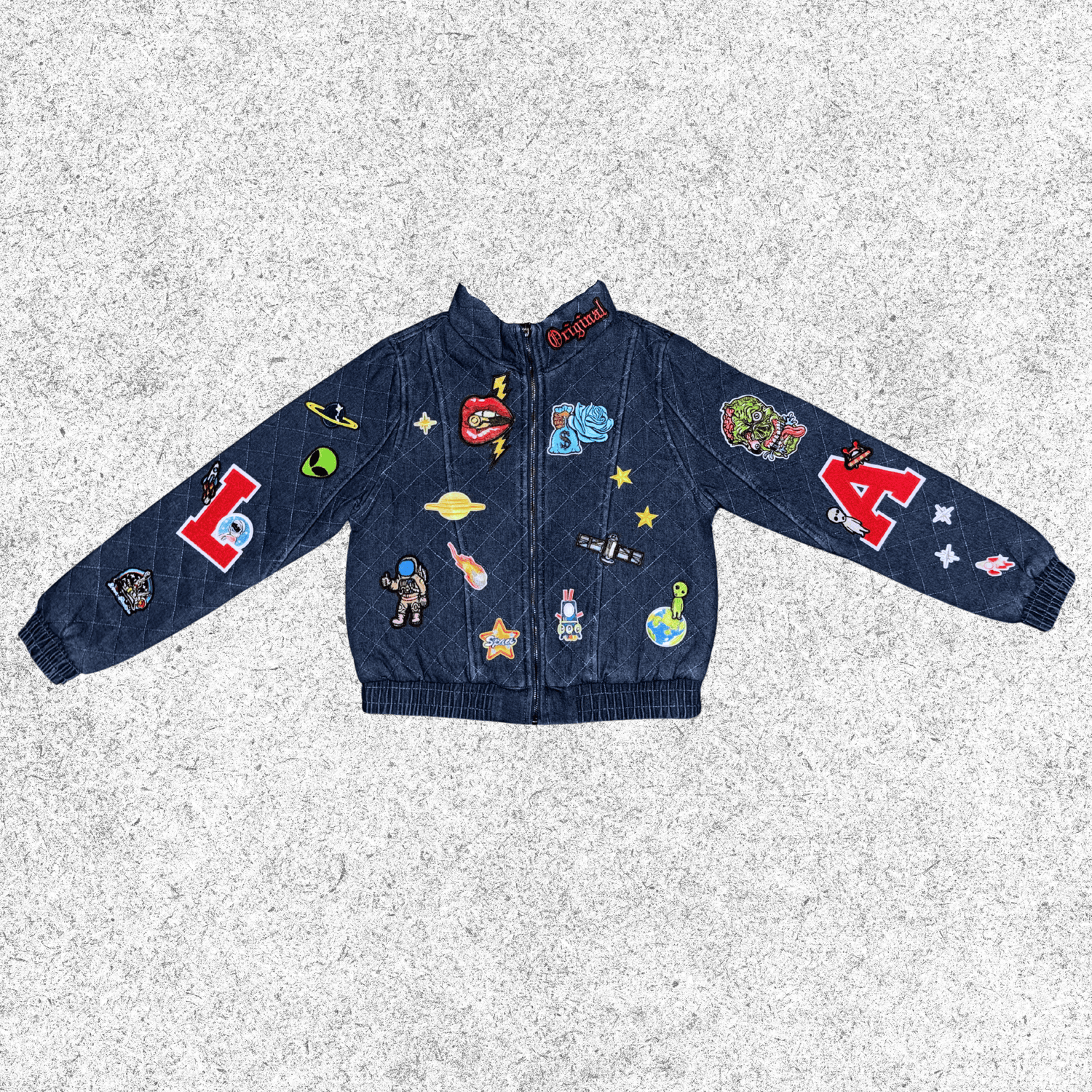 Navy blue jacket with various cosmic themed patches in a quilted bomber
