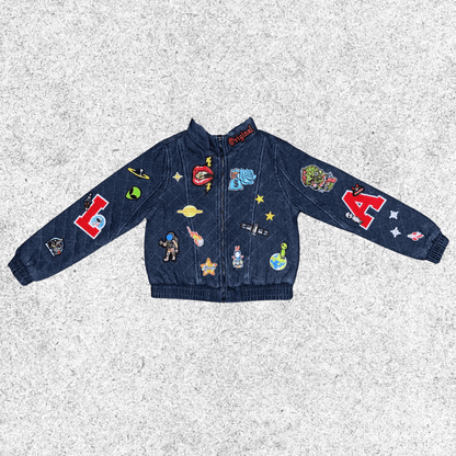 Navy blue jacket with various cosmic themed patches in a quilted bomber